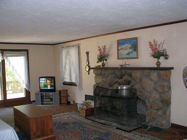 60 Patterson Road Shirley, MA 01464 - Photo 3 of 16 a living room with furniture and a fireplace