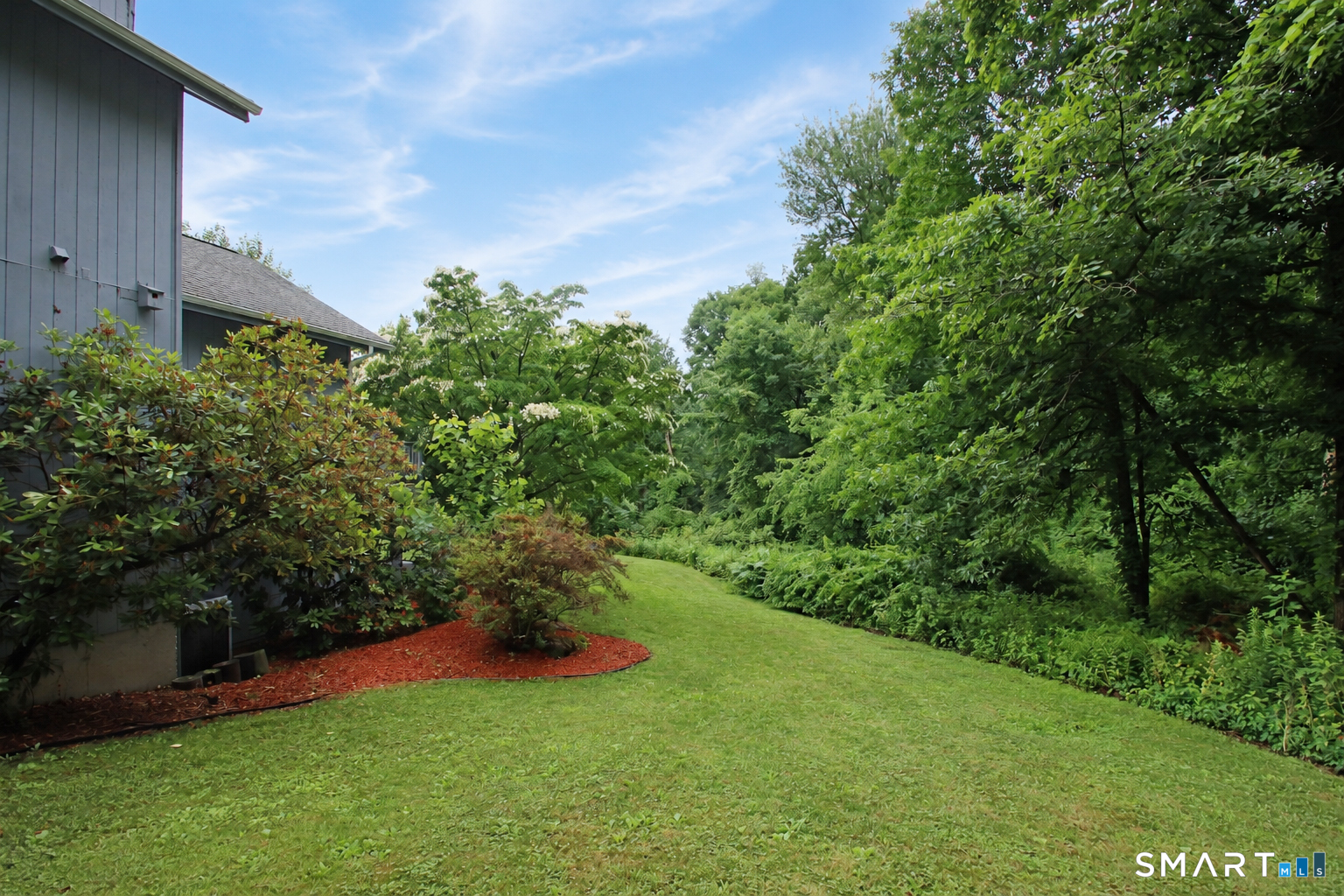 352 Center Street Wolcott, CT 06716 - Photo 38 of 40 a backyard of a house with lots of green space