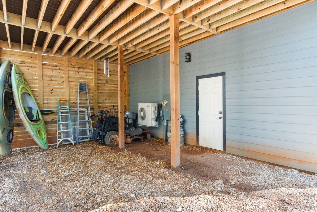 126 Hummingbird Way Copperhill, TN 37317 - Photo 15 of 47 a view of a room with gym equipment