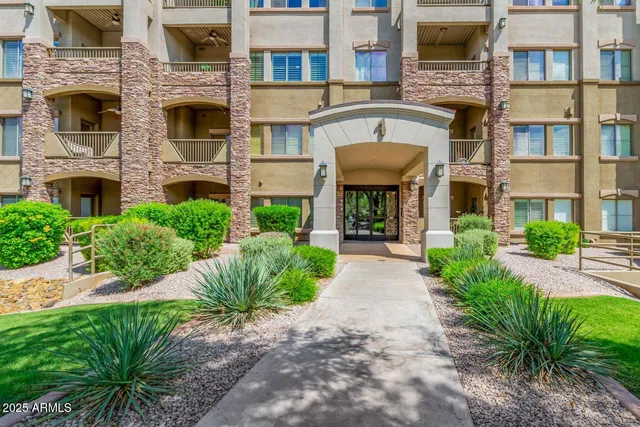a front view of a multi story residential apartment building