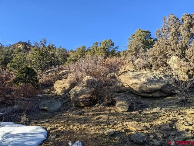 a view of mountain view with trees