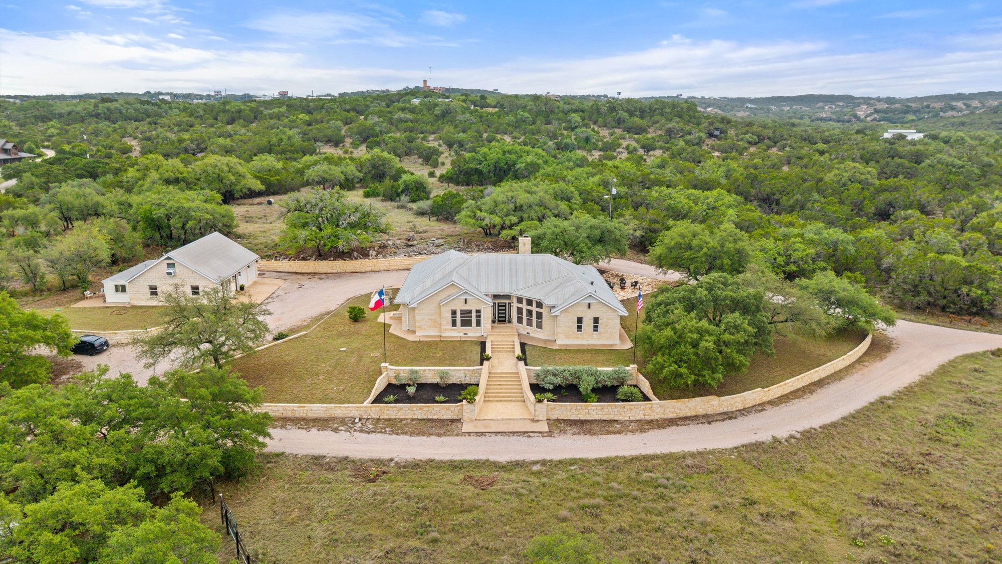 Welcome to this 11 Acre Paradise - 3 separate structures and an outdoor wonderland.