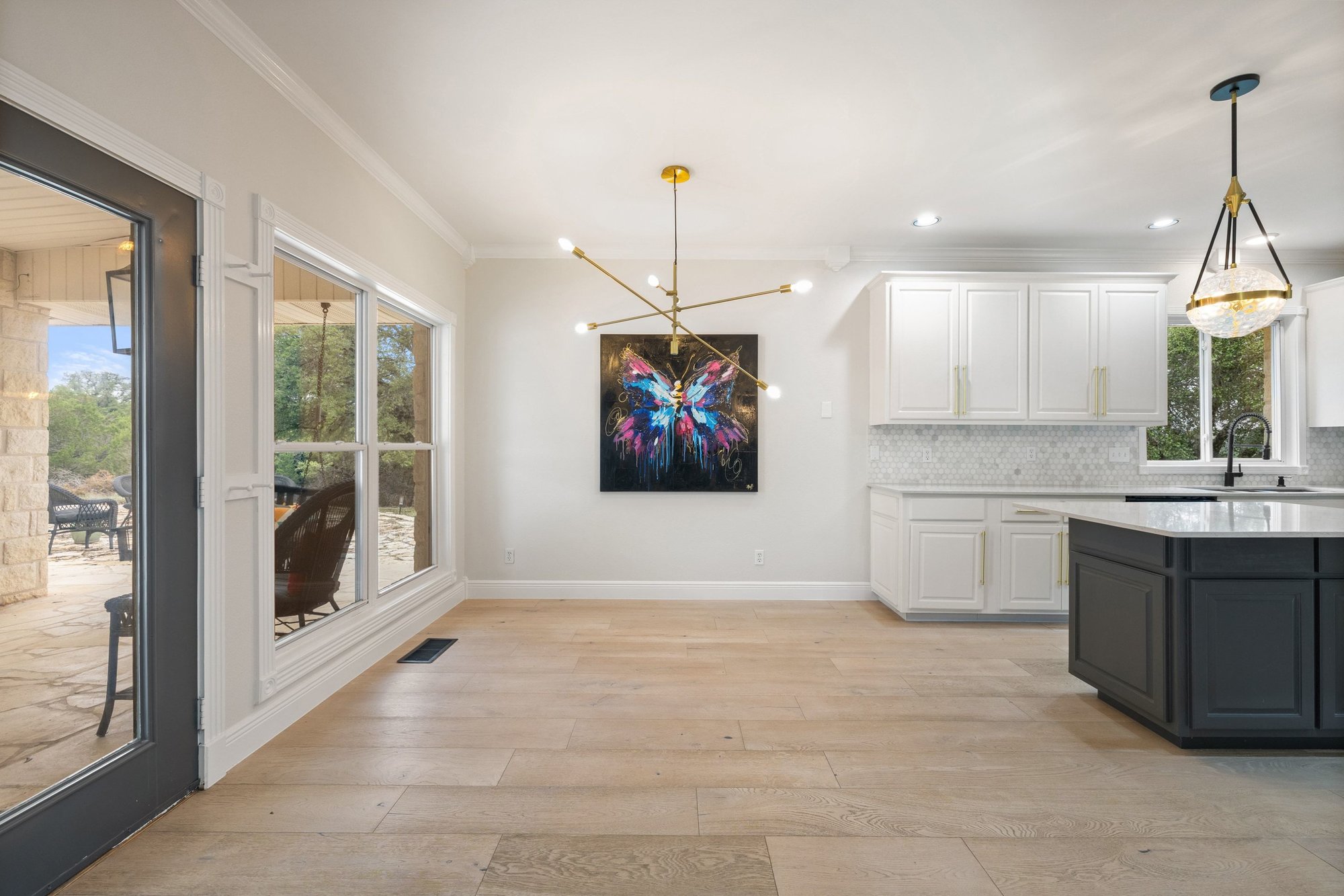 4915 Canyon Ranch Trail Spicewood, TX 78669 - Photo 16 of 40 Spacious breakfast area overlooks the backyard.