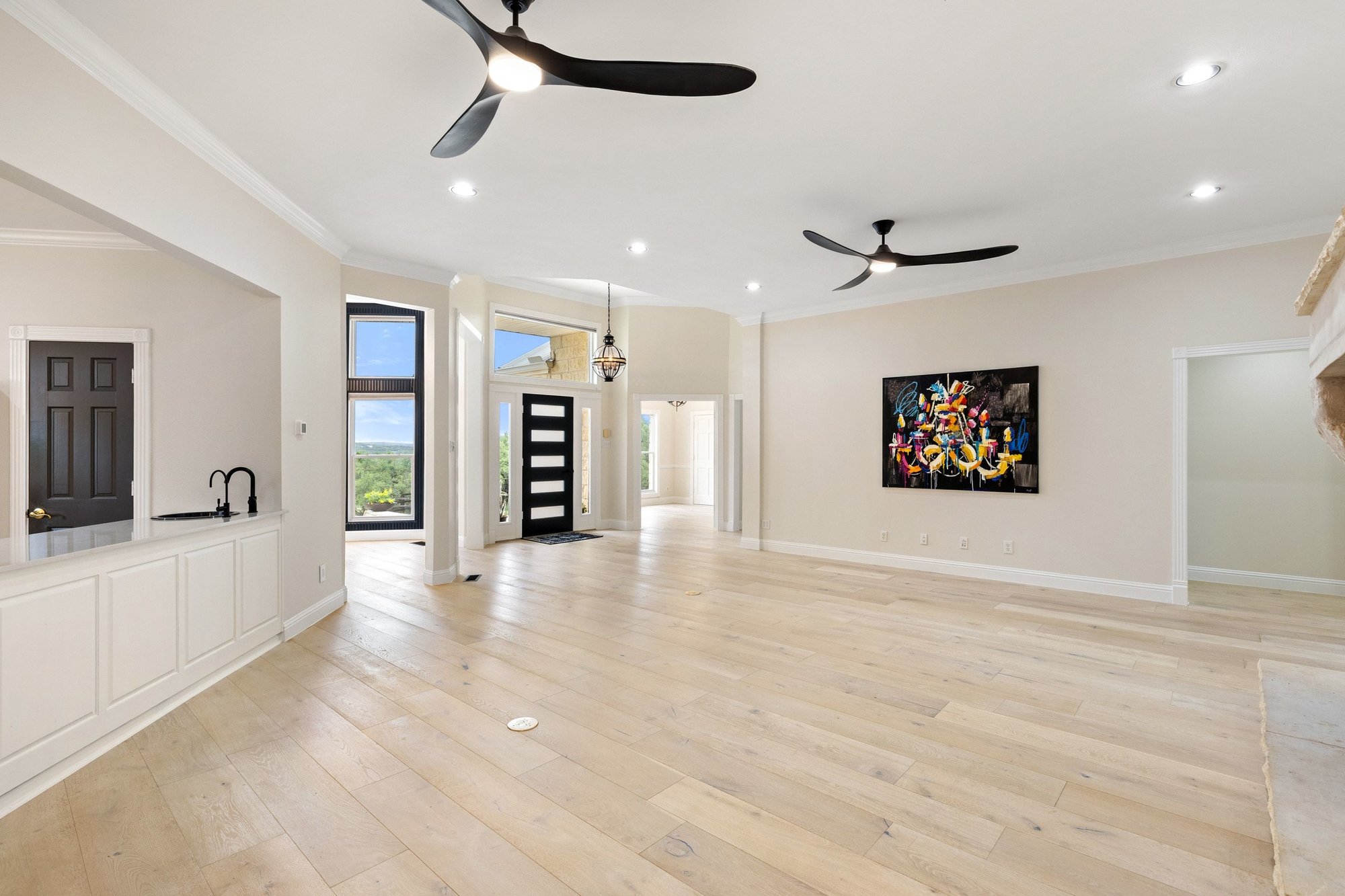 4915 Canyon Ranch Trail Spicewood, TX 78669 - Photo 17 of 40 Upon entry, to the left is a wing of bedrooms, to the right is the dining room.