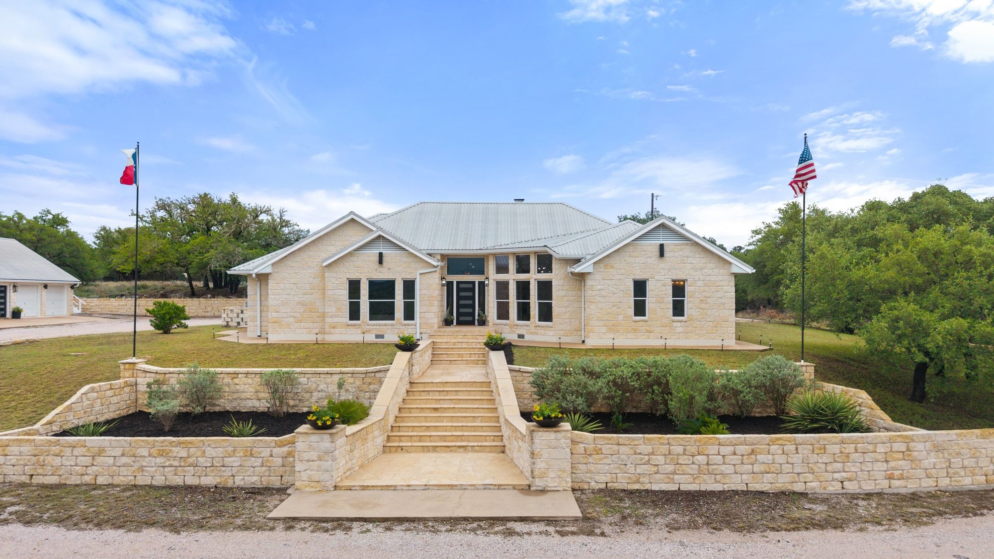 4915 Canyon Ranch Trail Spicewood, TX 78669 - Photo 2 of 40 The main house offers 4 beds & 3 full baths.