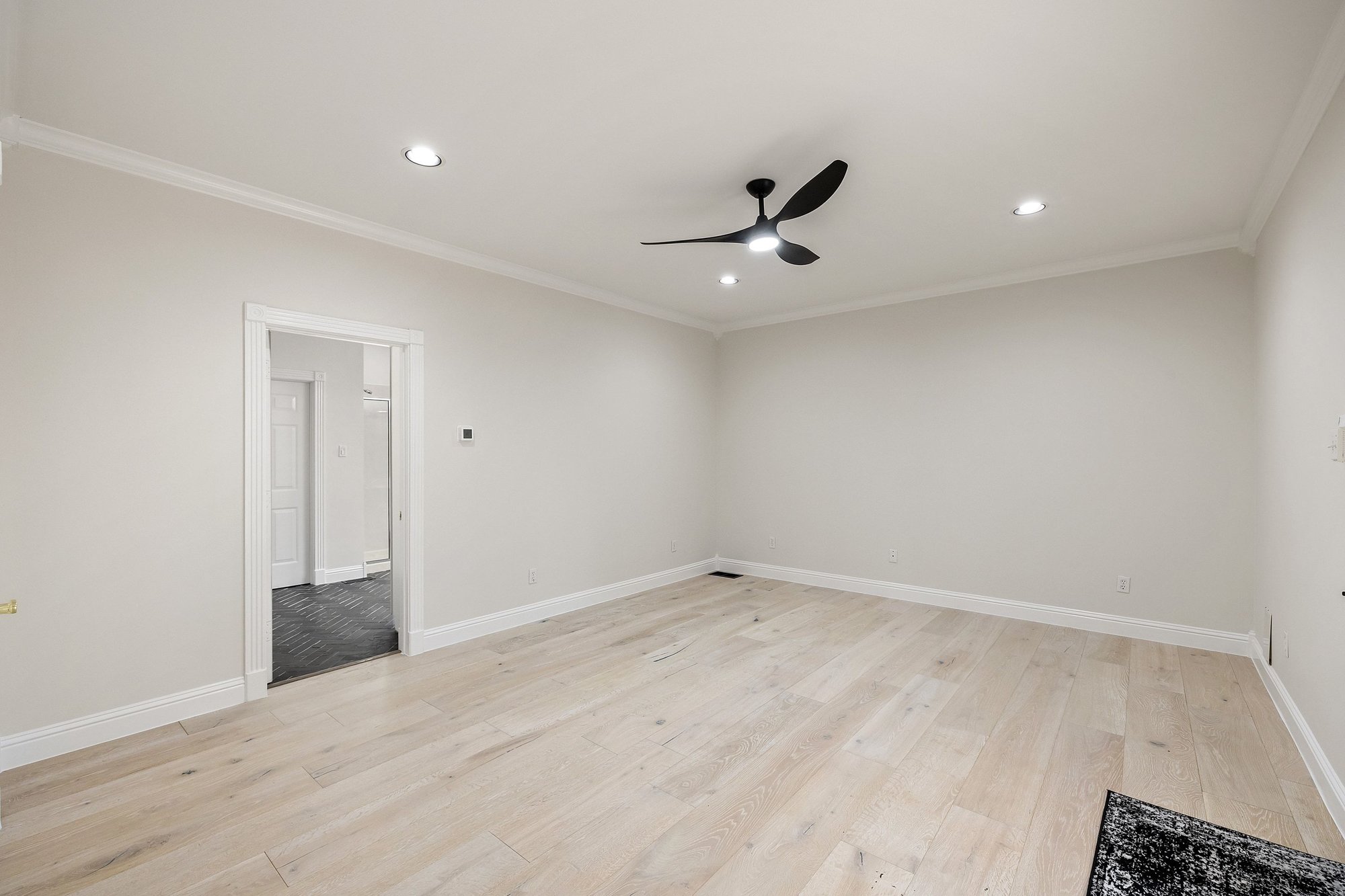 4915 Canyon Ranch Trail Spicewood, TX 78669 - Photo 22 of 40 Spacious primary with crown molding & recessed lighting.
