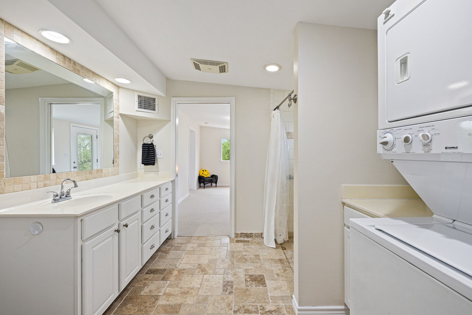 4915 Canyon Ranch Trail Spicewood, TX 78669 - Photo 36 of 40 Large vanity, walk-in shower, stackable washer/dryer, and a large closet (not pictured).