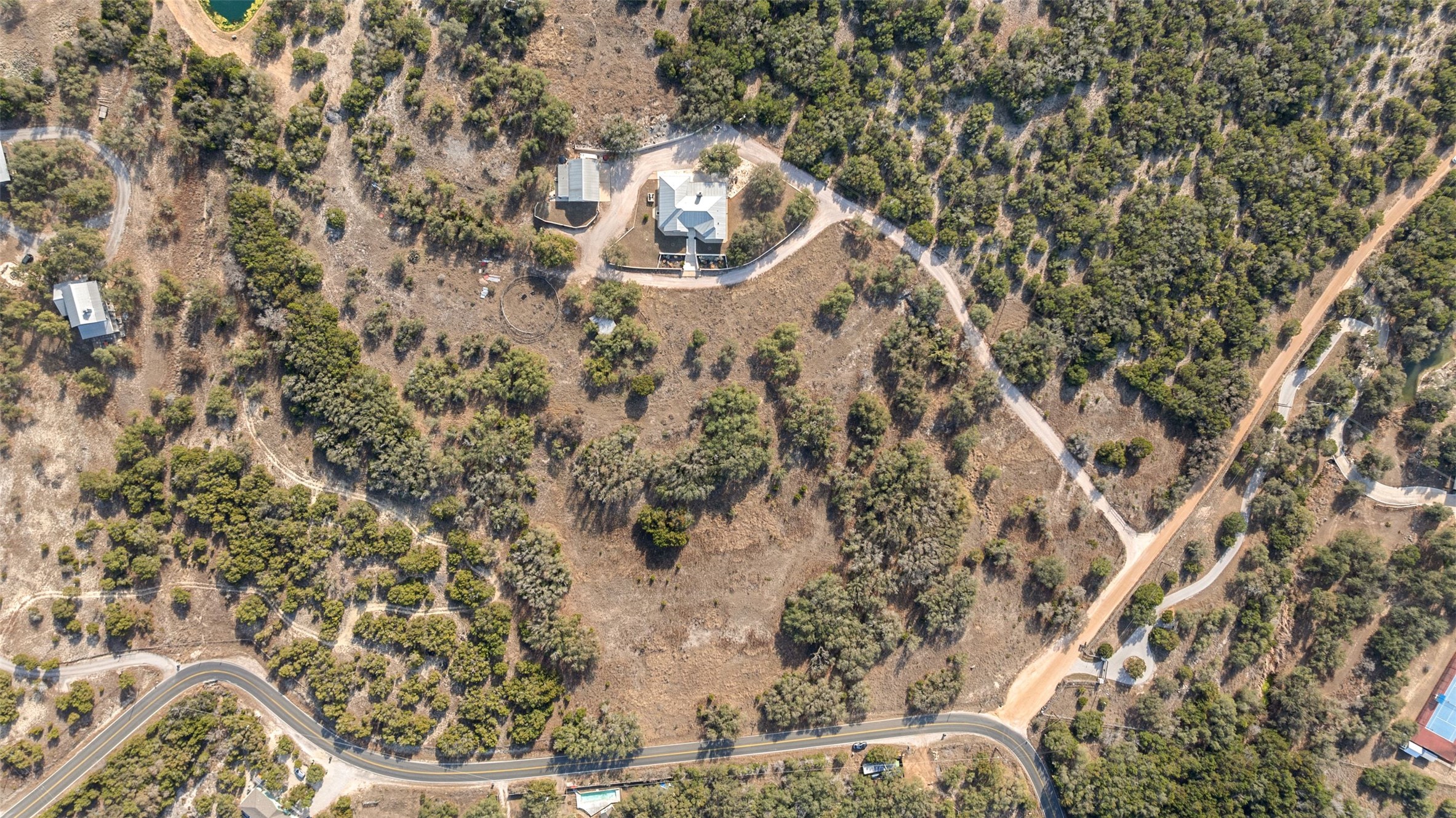 4915 Canyon Ranch Trail Spicewood, TX 78669 - Photo 40 of 40 Don't miss the adventure wonderland here - horse stables & corral, treehouse/zipline, gardens, chicken coop and more!