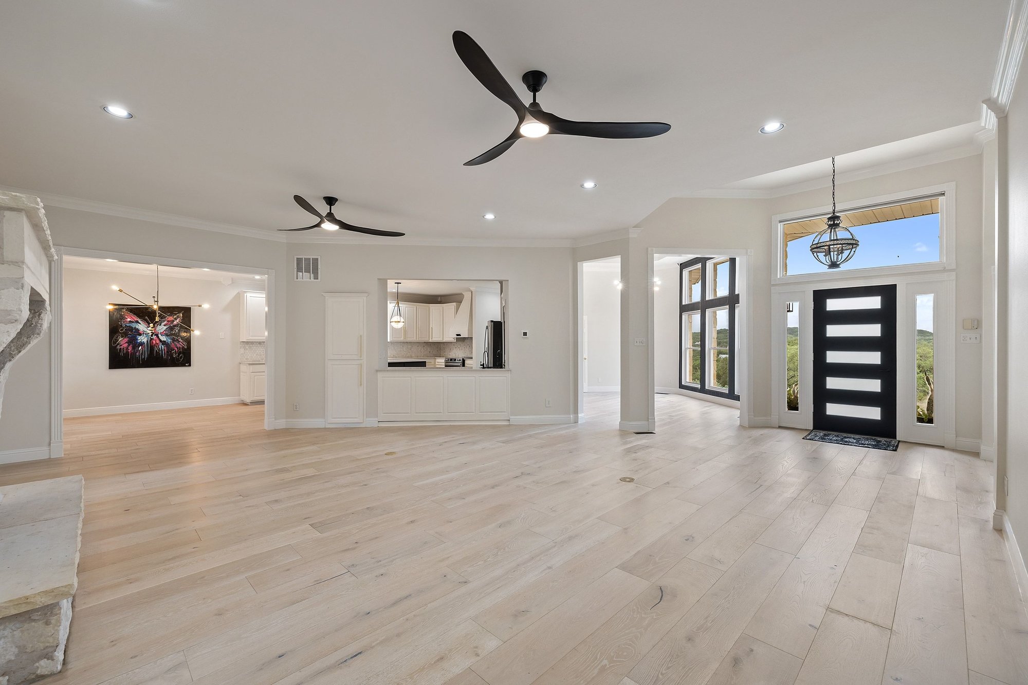 4915 Canyon Ranch Trail Spicewood, TX 78669 - Photo 8 of 40 Note the stunning European Oak brushed engineered hardwoods.
