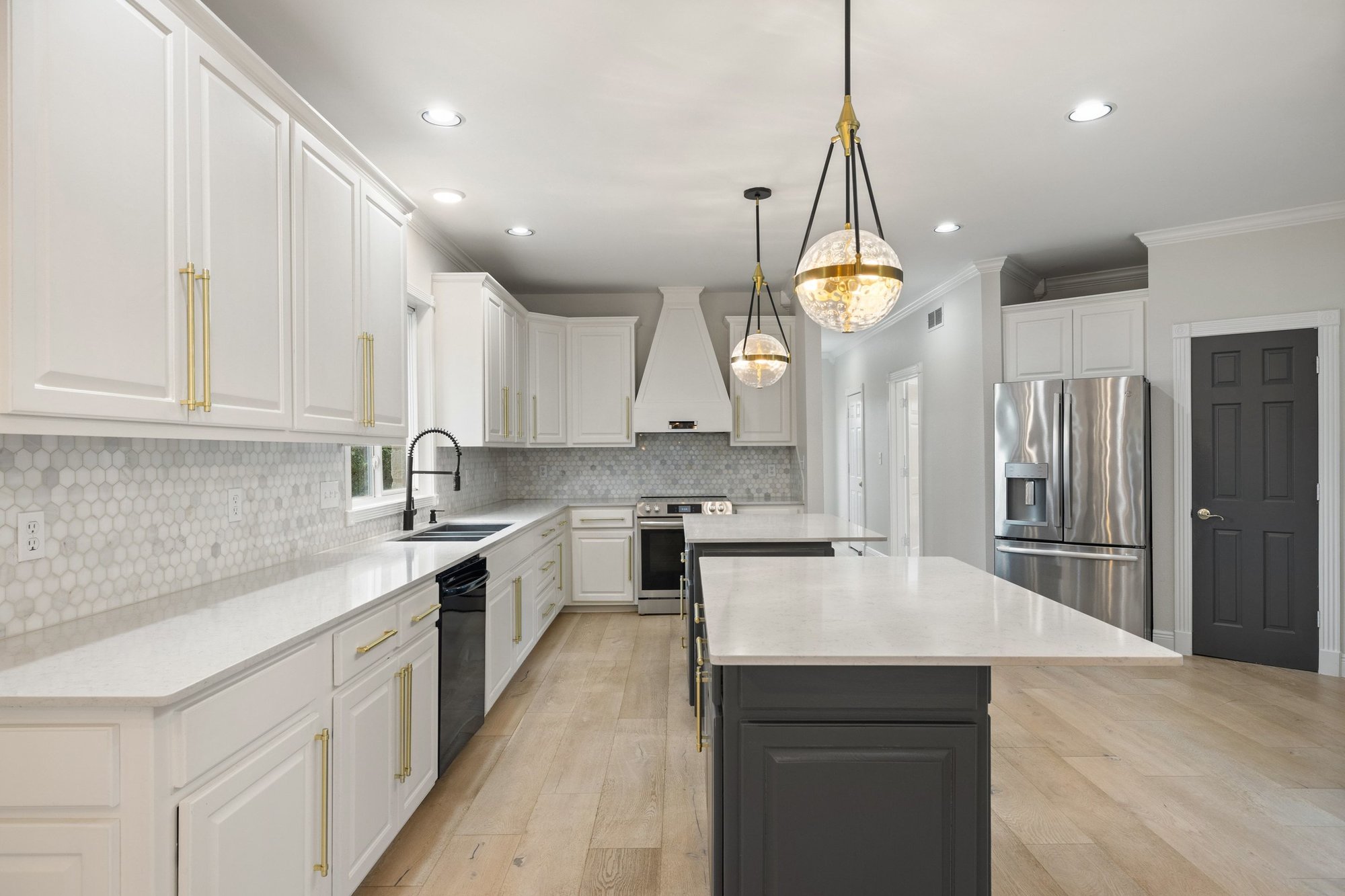 4915 Canyon Ranch Trail Spicewood, TX 78669 - Photo 10 of 40 Huuuggggeeee kitchen with TWO islands.