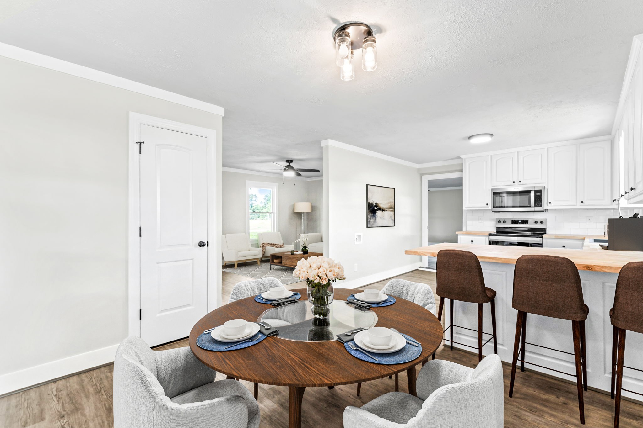 1950 Norton Road Lawrenceburg, TN 38464 - Photo 16 of 43 a view of a dining room with furniture and wooden floor