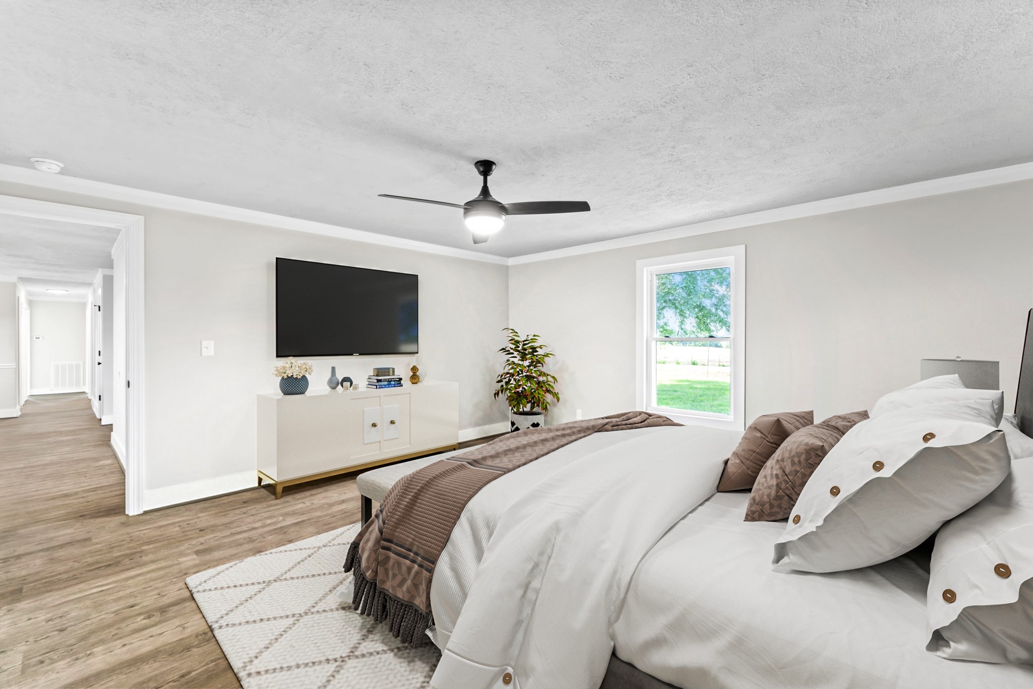 1950 Norton Road Lawrenceburg, TN 38464 - Photo 24 of 43 a bedroom with a bed tv and a window