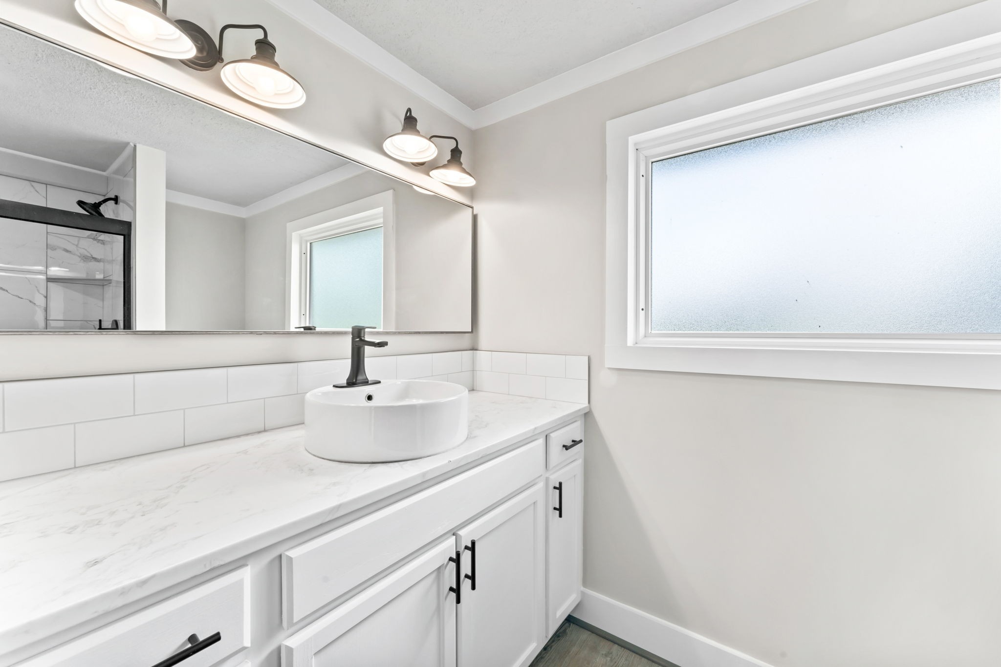 1950 Norton Road Lawrenceburg, TN 38464 - Photo 26 of 43 a bathroom with a sink and a mirror