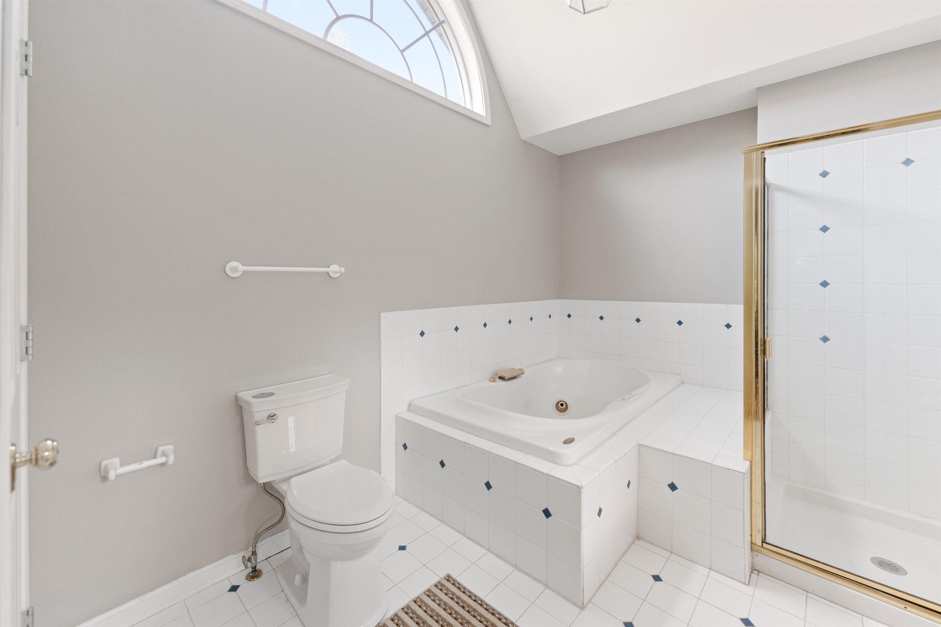 703 Rock Court Dixon, IL 61021 - Photo 20 of 42 a bathroom with a sink a toilet and shower