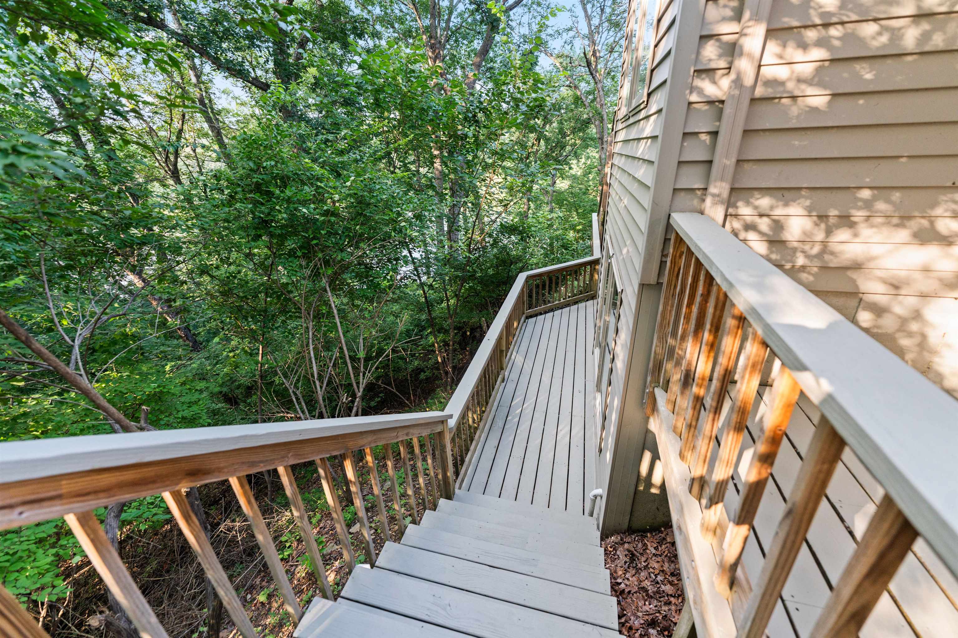 703 Rock Court Dixon, IL 61021 - Photo 31 of 42 a view of balcony with wooden floor and fence