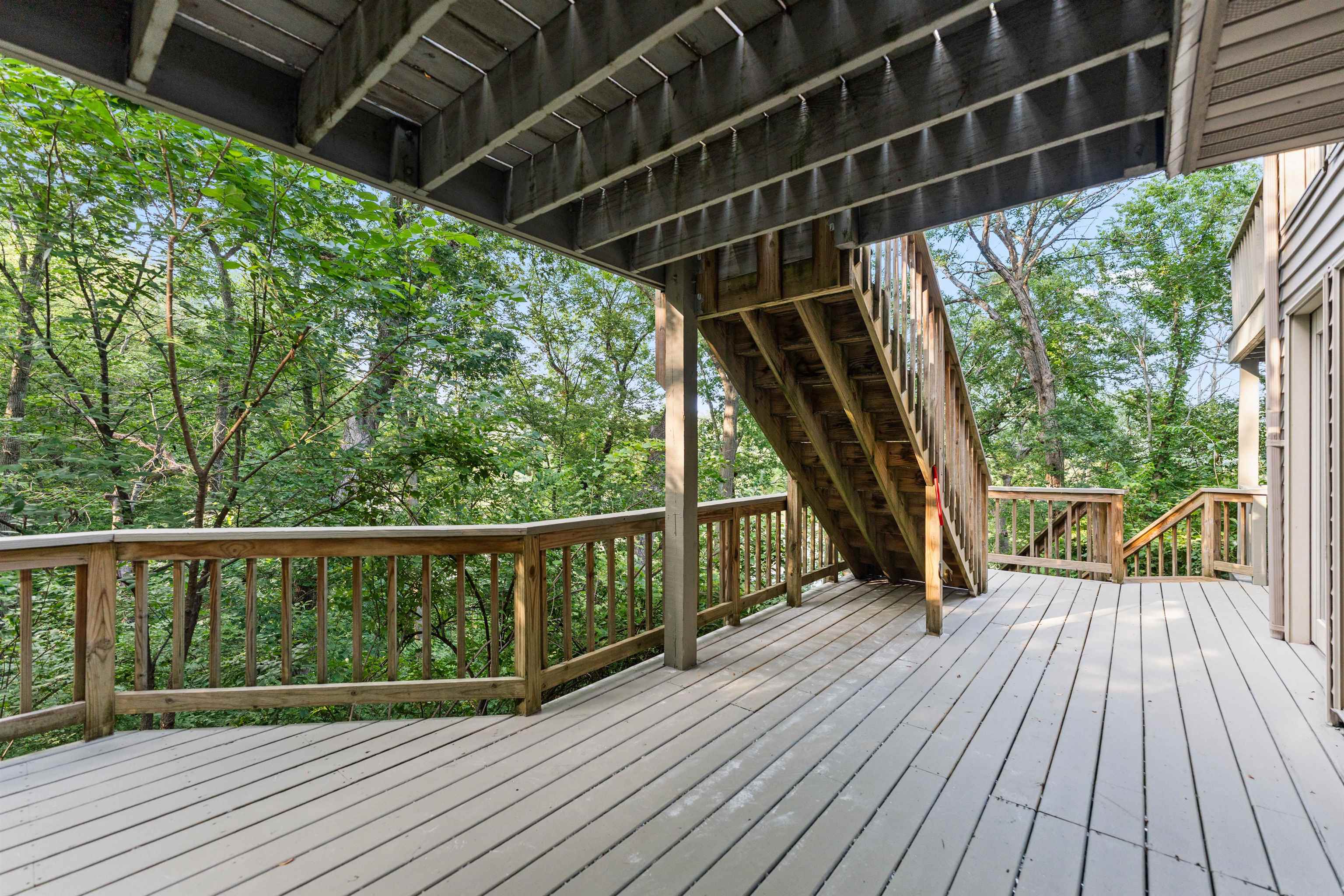 703 Rock Court Dixon, IL 61021 - Photo 32 of 42 a view of roof deck with wooden floor and outdoor space