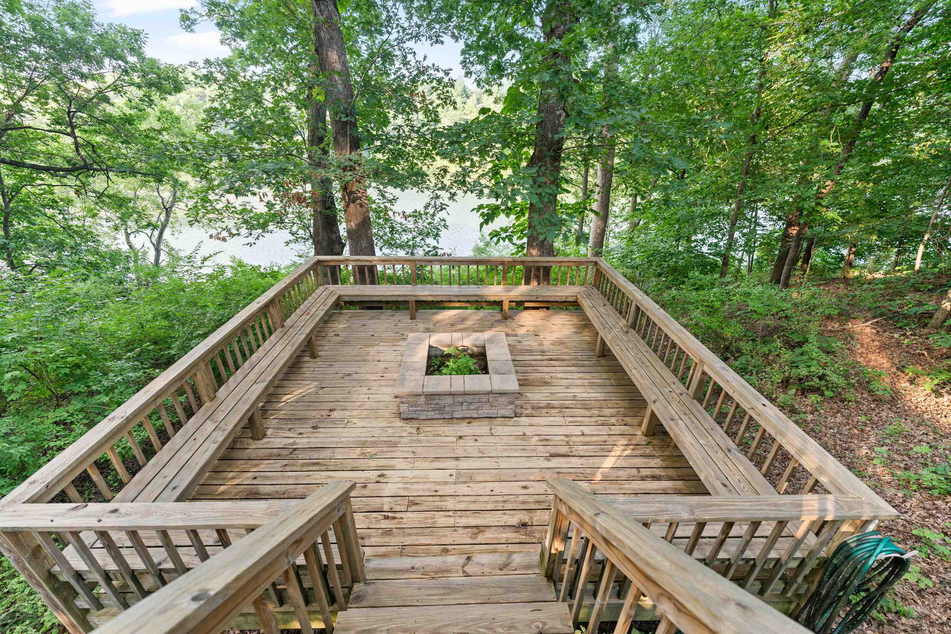 703 Rock Court Dixon, IL 61021 - Photo 37 of 42 a view of balcony with wooden floor and fence