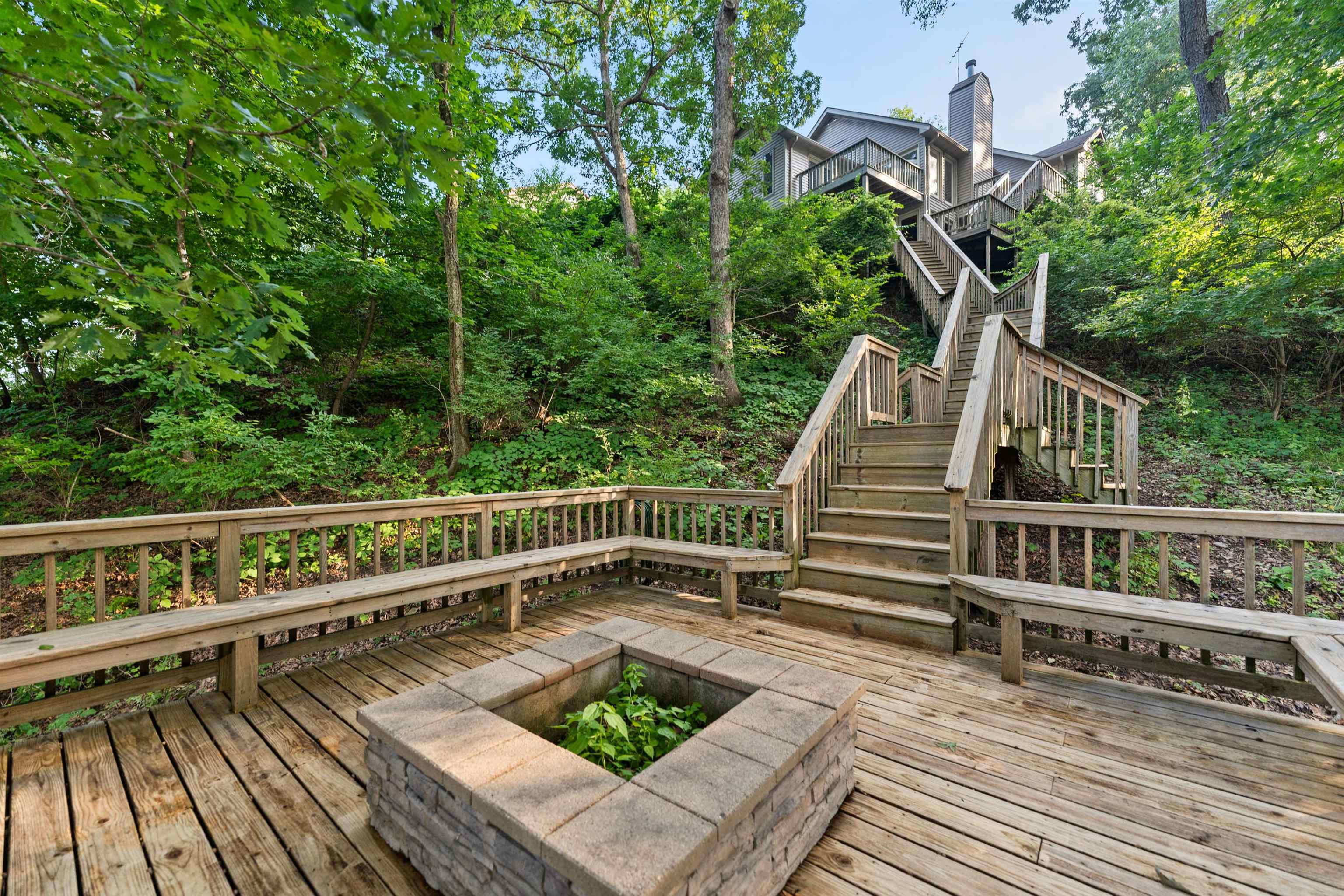 703 Rock Court Dixon, IL 61021 - Photo 39 of 42 a view of a roof deck with wooden floor and fence