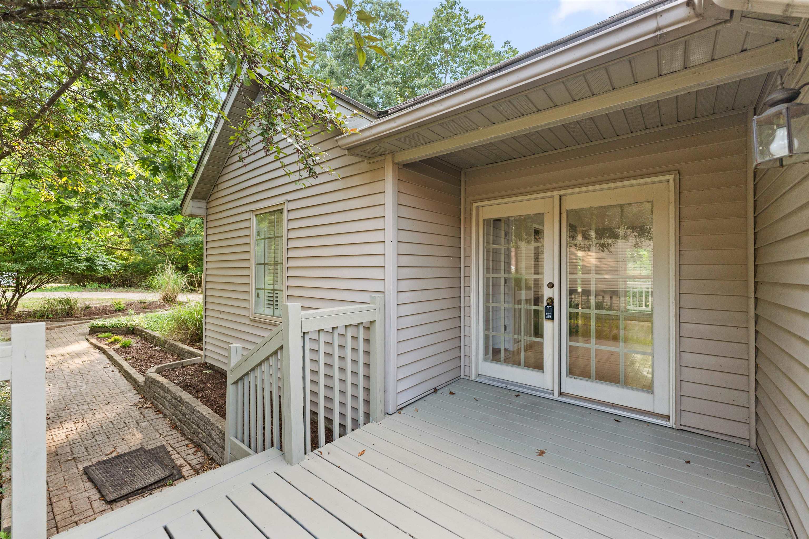 703 Rock Court Dixon, IL 61021 - Photo 4 of 42 a view of a house with backyard and wooden fence