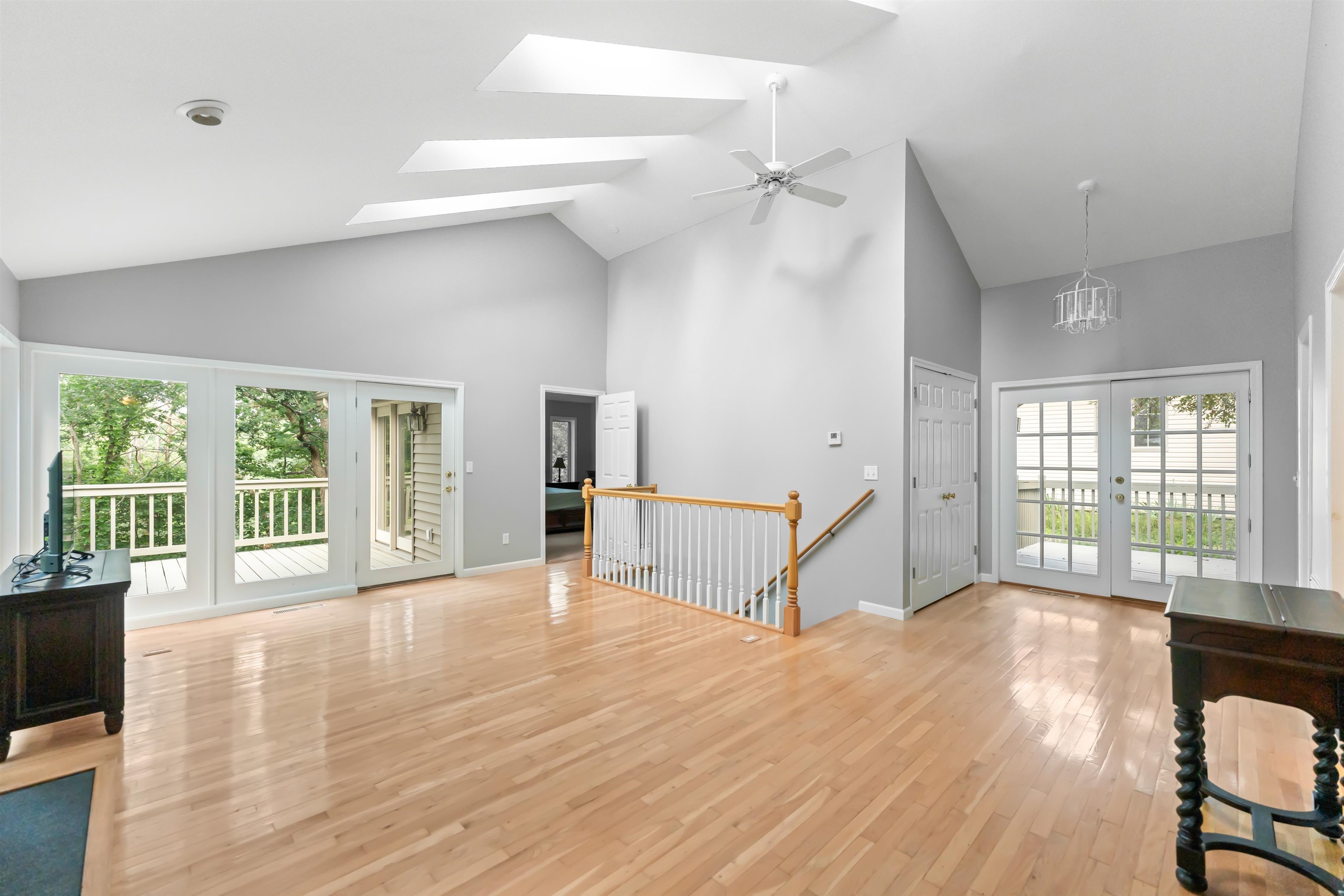 703 Rock Court Dixon, IL 61021 - Photo 9 of 42 a view of empty room with wooden floor and fan