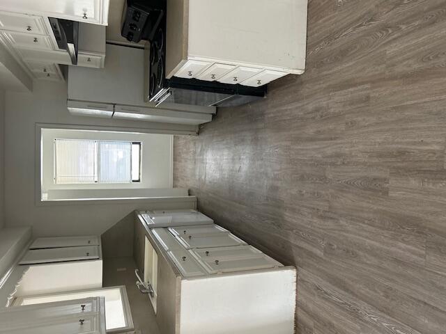 2007 South Loop 289 Lubbock, TX 79423 - Photo 3 of 8 a utility room with dryer and washer