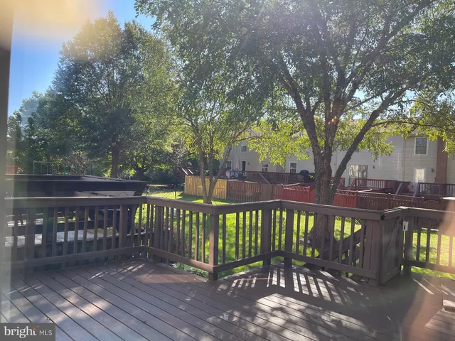 a view of a wooden roof deck