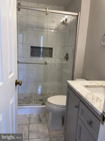 an empty room with fireplace