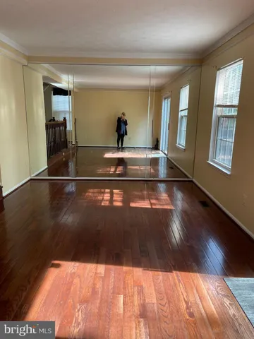 a view of living room with wooden floor