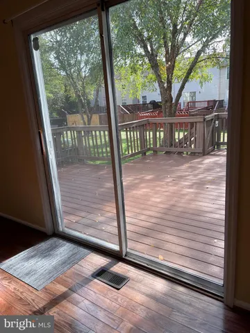 a view of a porch with a bench
