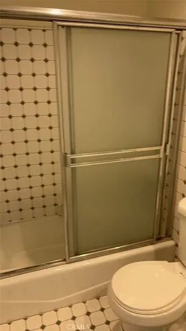 a bathroom with a sink and a shower