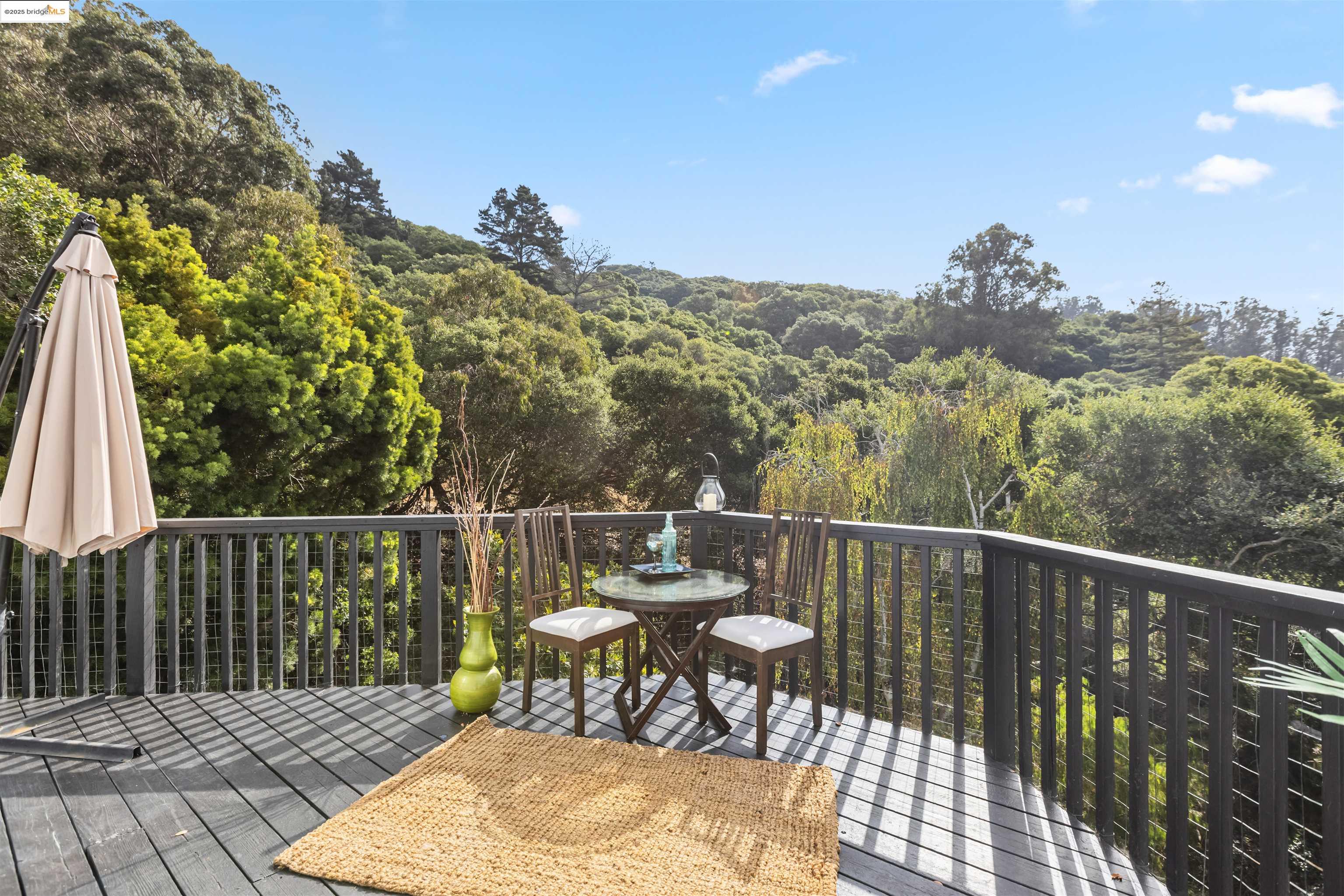 7318 Gladys Avenue El Cerrito, CA 94530 - Photo 2 of 33 a view of a balcony with chair and wooden floor