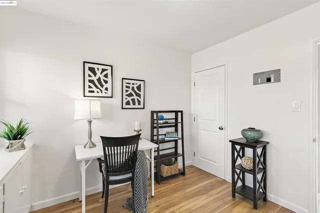 a workspace with furniture and window