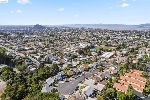 an aerial view of residential house with an outdoor space