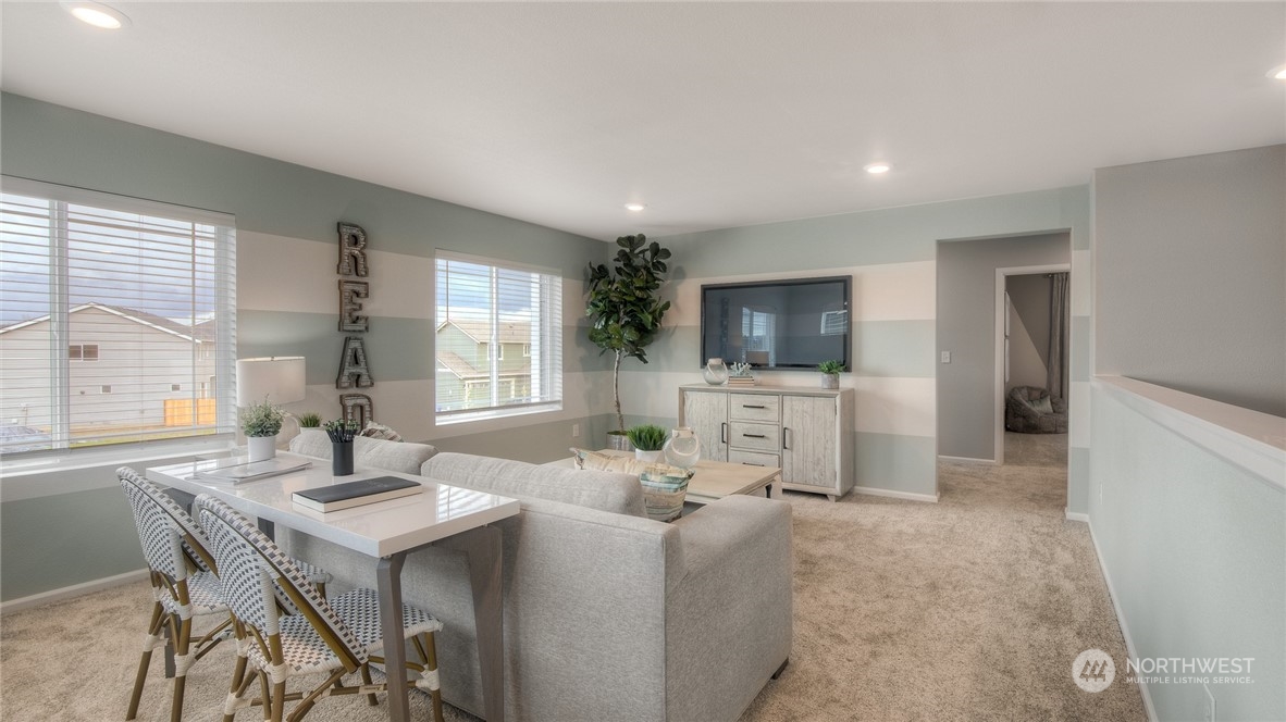 1323 Baker Hts Loop Bremerton, WA 98312 - Photo 11 of 18 a living room with furniture and a flat screen tv