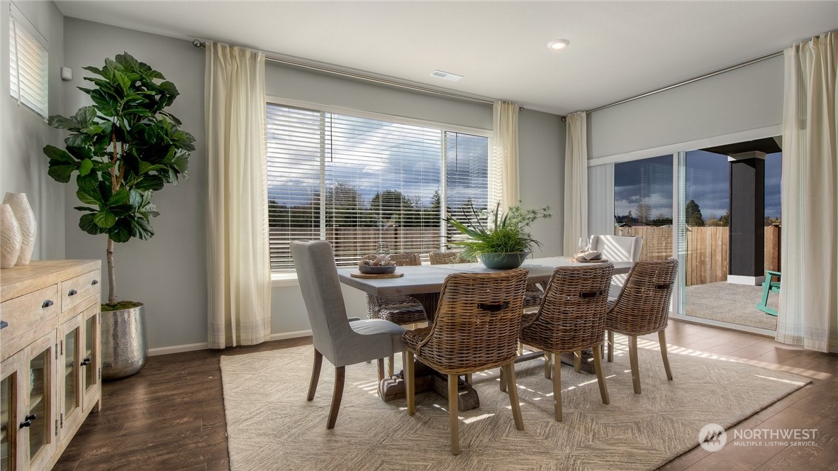 1323 Baker Hts Loop Bremerton, WA 98312 - Photo 6 of 18 a view of a dining room with furniture window and outside view
