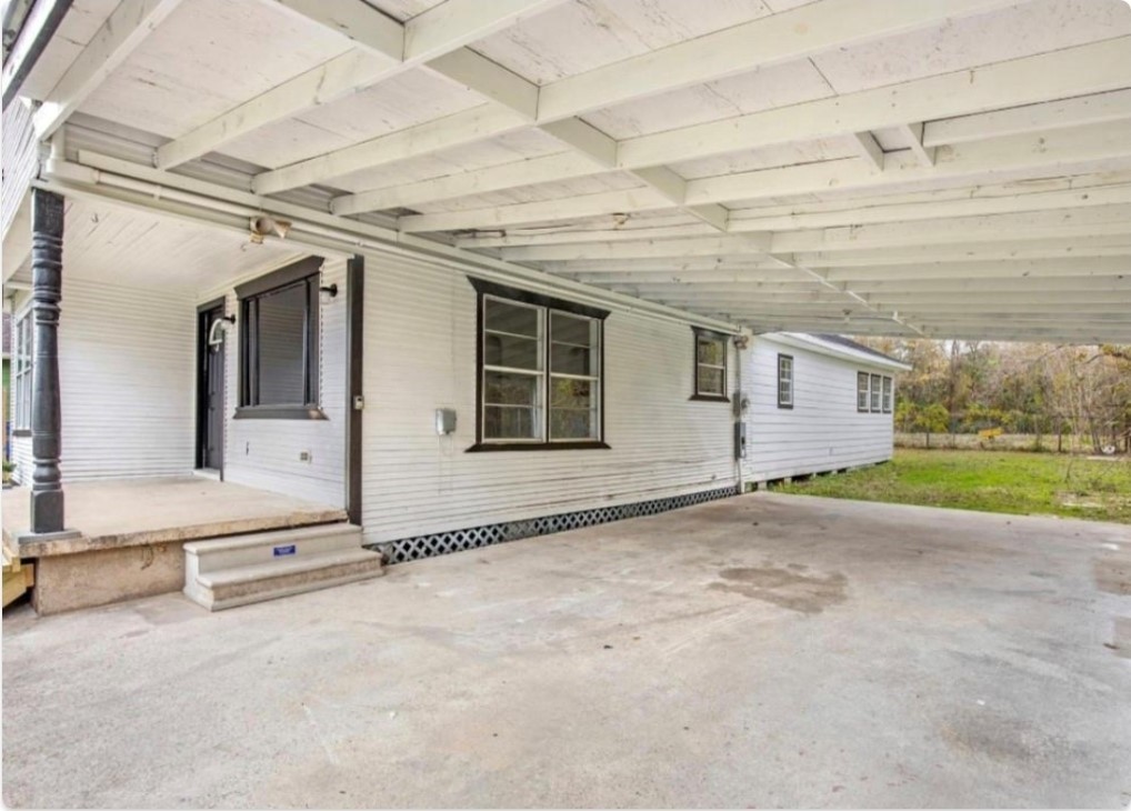 116 Trahan Street Ames, TX 77575 - Photo 21 of 23 a view of a house with a swimming pool