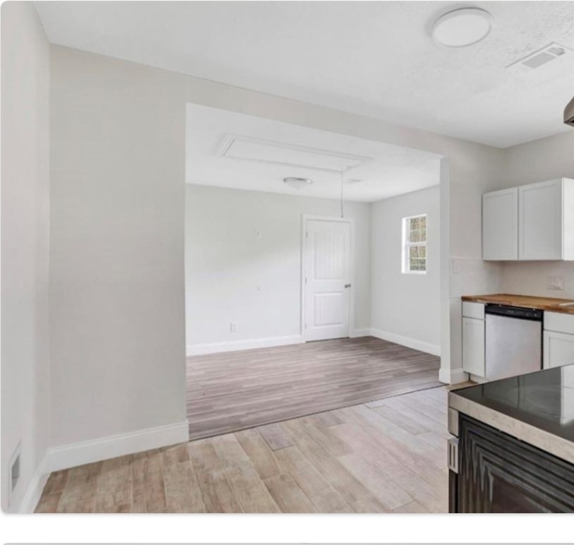 116 Trahan Street Ames, TX 77575 - Photo 8 of 23 a view interior of a house and an empty room