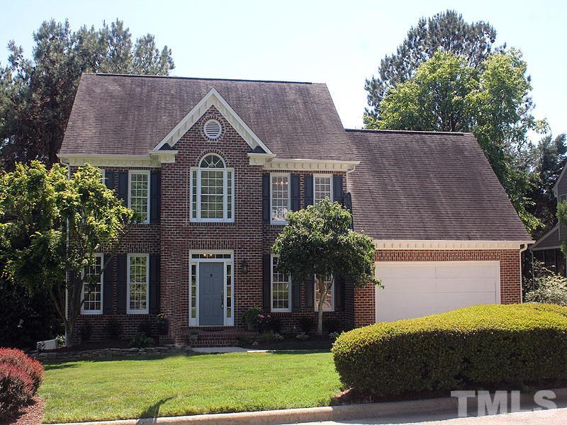2705 Amstel Way Raleigh, NC 27613 - Photo 1 of 25 a front view of a house with a yard and garage