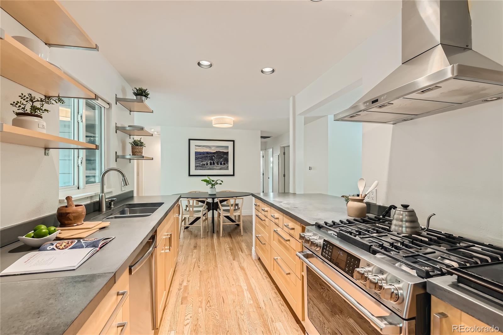 265 30th Street Boulder, CO 80305 - Photo 11 of 25 a kitchen with stove and cabinets