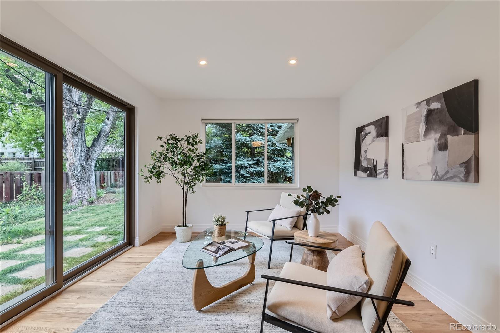 265 30th Street Boulder, CO 80305 - Photo 12 of 25 a living room with furniture and a large window