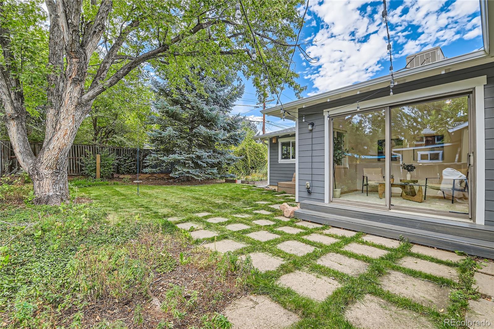265 30th Street Boulder, CO 80305 - Photo 25 of 25 front view of a house with a yard
