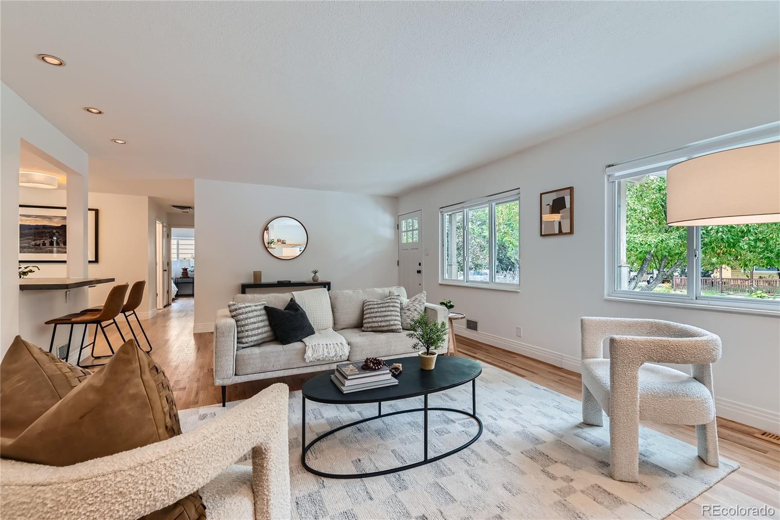 265 30th Street Boulder, CO 80305 - Photo 5 of 25 a living room with furniture a rug and a window