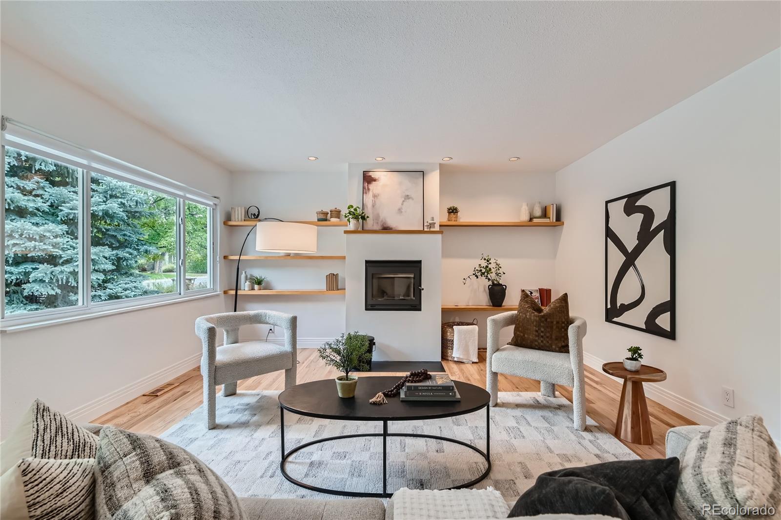 265 30th Street Boulder, CO 80305 - Photo 6 of 25 a living room with furniture a rug and a large window