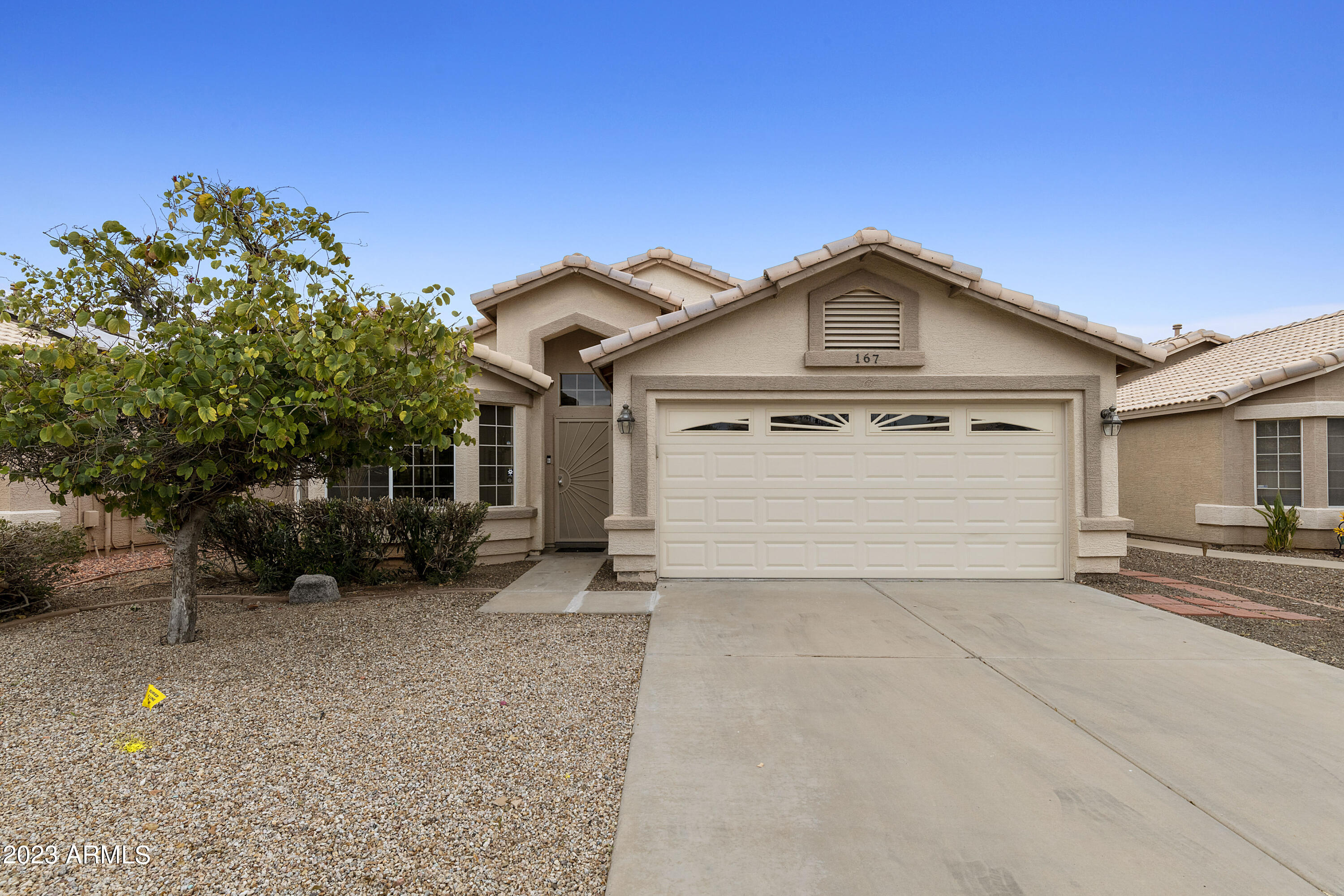 167 West Smoke Tree Road Gilbert, AZ 85233 - Photo 1 of 31 a view of a house with a outdoor space