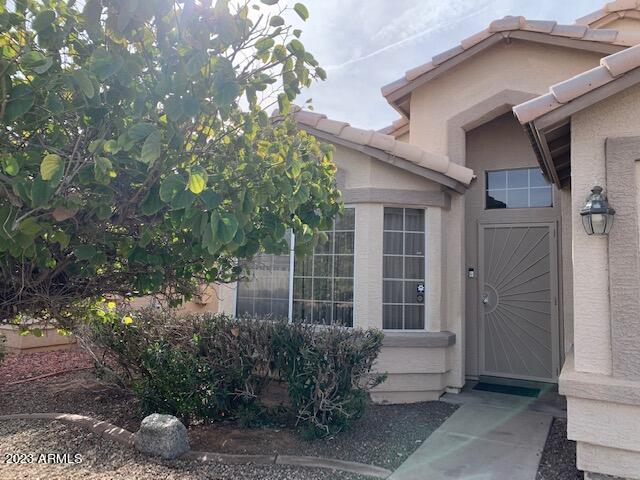 167 West Smoke Tree Road Gilbert, AZ 85233 - Photo 3 of 31 a house view with a outdoor space