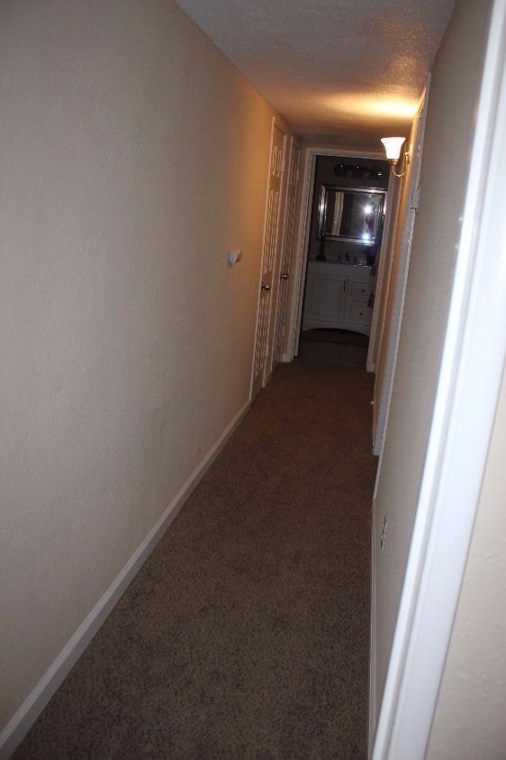 1133 D Street Reedley, CA 93654 - Photo 9 of 10 a view of hallway with stairs