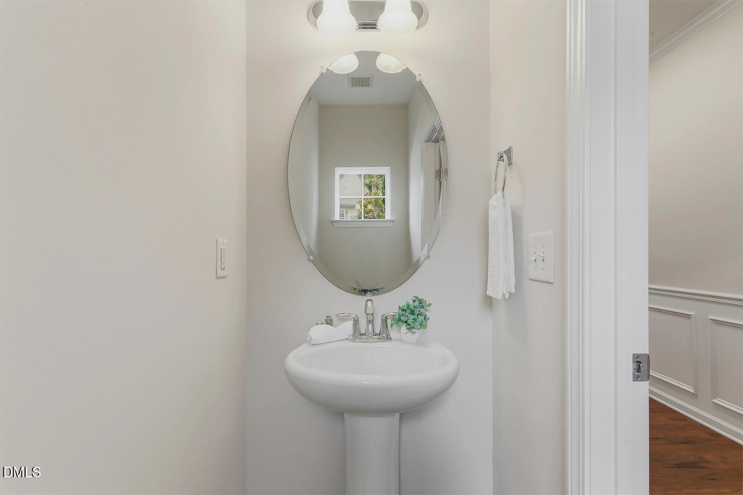 9137 Wooden Road Raleigh, NC 27617 - Photo 20 of 55 021-014-Half Bathroom-1500x1000