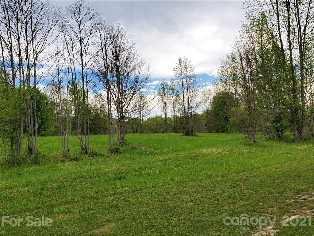16.104 Ruben Road, Unit 2713 Monroe, NC 28112 - Photo 11 of 15 a view of a park with large trees