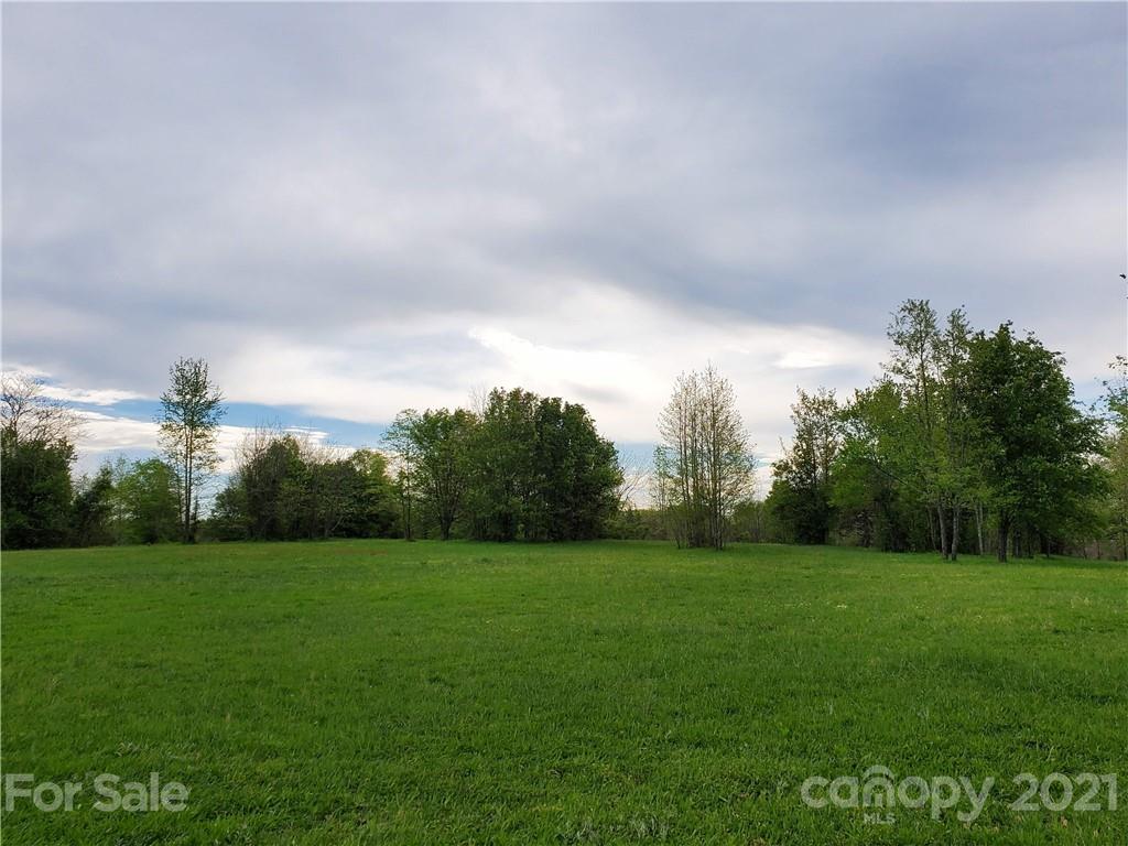 16.104 Ruben Road, Unit 2713 Monroe, NC 28112 - Photo 7 of 15 a view of a grassy field