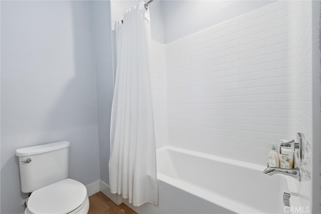 15828 Kingston Road Chino Hills, CA 91709 - Photo 26 of 33 a bathroom with a toilet and a bathtub